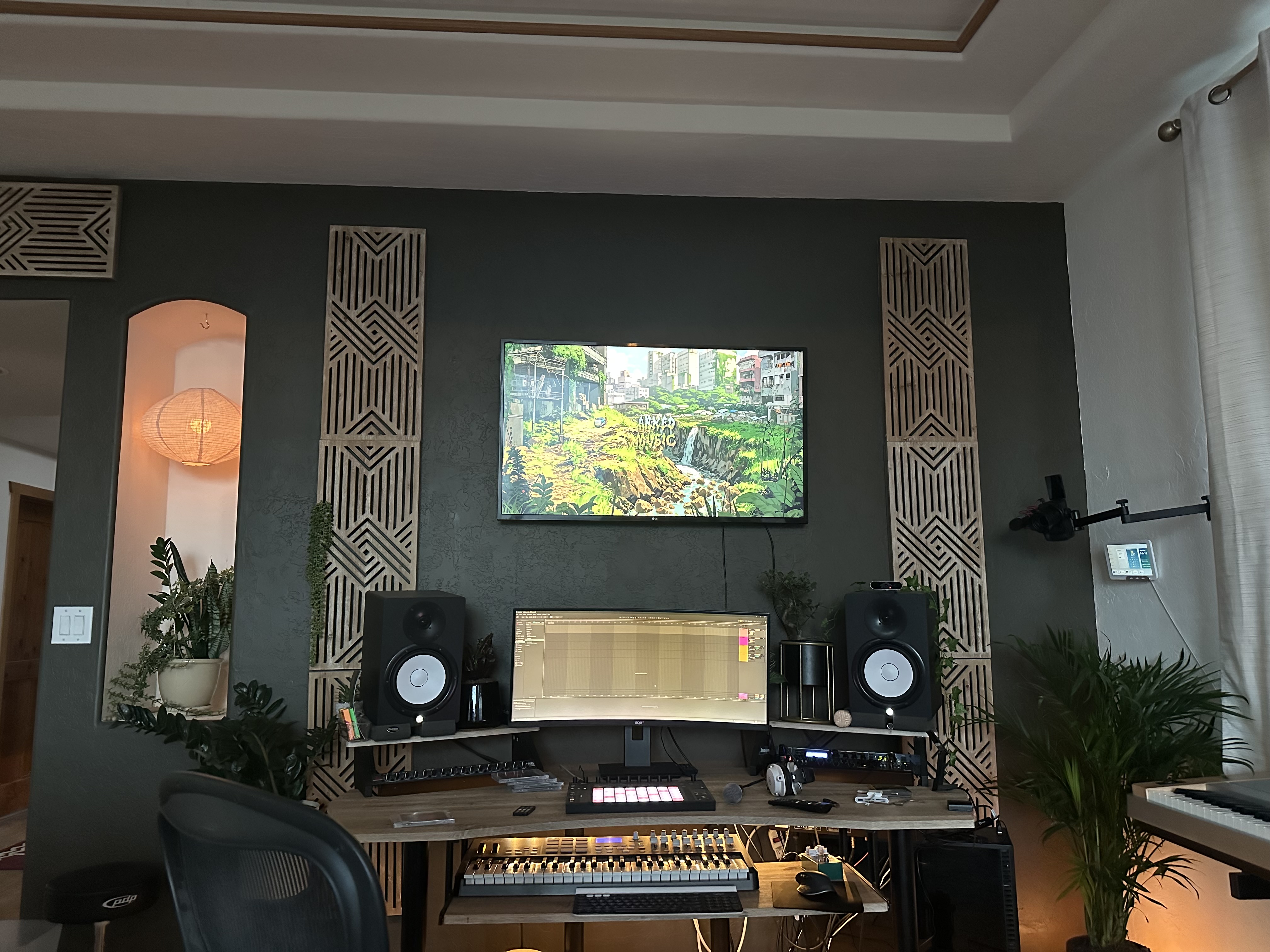 Studio A control room: dual displays, monitors, wood acoustic panels